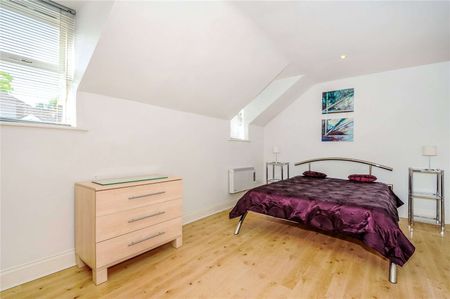 A top floor two bedroom flat just off Eton High Street with one allocated parking space. - Photo 4