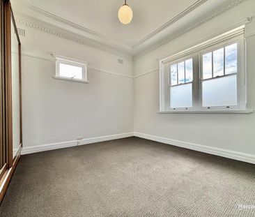 Charming Three Bedroom Home with Sunroom & Large Backyard... - Photo 1