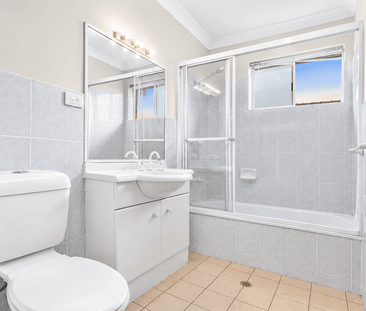 Top-Floor Living with Air Conditioning in Boutique Clayfield Complex - Photo 6