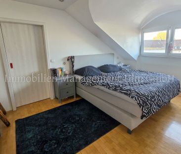 Stilvolle 2-Zimmer-Dachgeschosswohnung mit Münsterblick! - Foto 1