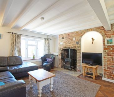 A characterful three-bedroom fisherman’s cottage in Selsey, with ga... - Photo 1