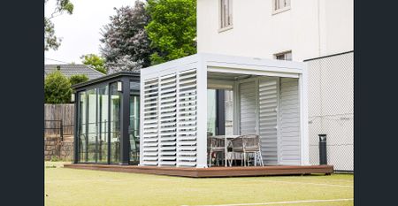 Stunning Loft-Style Unit with Large Playground and Sunroom - Photo 2