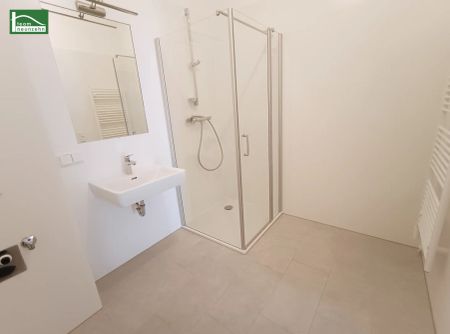 Ruhe auf der begrünten Terrasse genießen - hofseitige 2 Zimmer Neubauwohnung in bester Lage! - Photo 4