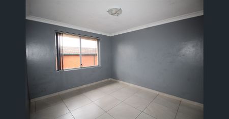 TWO BEDROOM TOP FLOOR UNIT WITH GARAGE - Photo 3