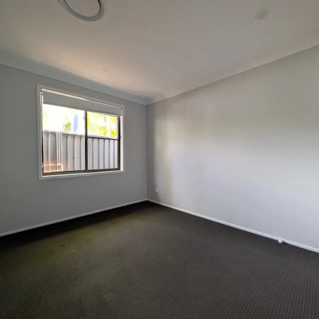 Modern 4-Bedroom Home in a Convenient Gorokan Location - Photo 3