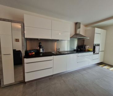 Une terrasse aux dimensions généreuses - Photo 1