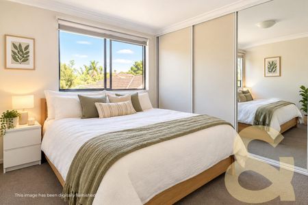 Bright & Spacious 3-Bedroom Unit in Convenient Location - Photo 2
