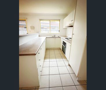 Stylishly Refreshed Townhouse with Unbeatable Convenience - Photo 3