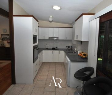 Charming Family Home with Pool in Prime Location - Photo 6