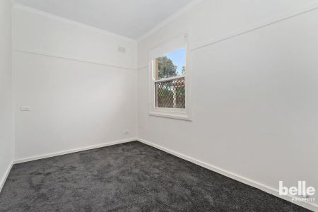 Modern & Charming 3-Bedroom - Photo 3