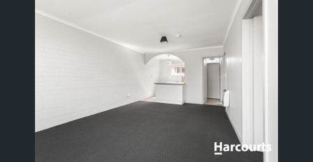 Centrally Located Unit with a Carport! - Photo 2