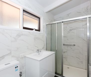 A newly renovated 1-bedroom unit - Photo 1