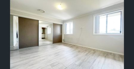 Modern Four-Bedroom Townhouse in Prime Location - Photo 3
