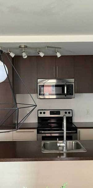 3 1/2 -condo Urbania-1er juin - Photo 1