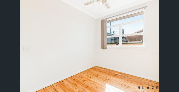 Three Bedroom Home with Character and Comfort! - Photo 1