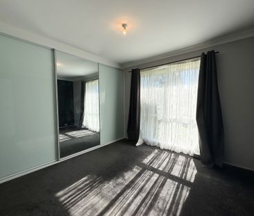 Peaceful Suburban Living in a Central, Well-Connected Location - Photo 4