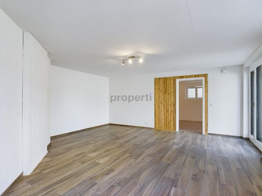 Charmante 2.5-Zimmer Wohnung in ruhigem Einfamilienhaus-Wohnquartier - Foto 1