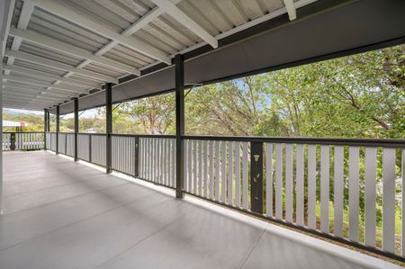 A charming home set on a generous block with a sprawling backyard. - Photo 2