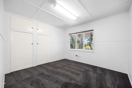 Charming fully renovated home is ready for its next tenants to enjoy! - Photo 2