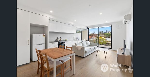 Sophisticated Boutique Living with City Views - Photo 1