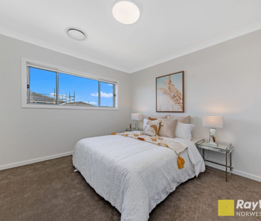 Modern 5-Bedroom Family Home in the Heart of Marsden Park - Photo 1