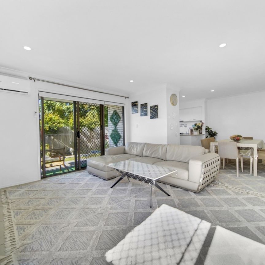 BEAUTIFULLY DESIGNED 3-BEDROOM UNIT - Photo 1