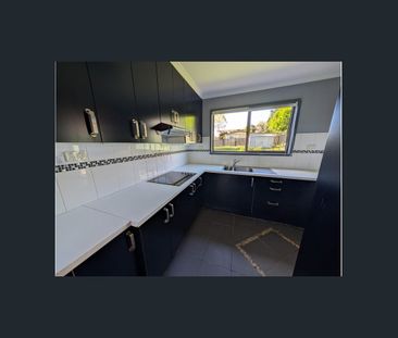 NEAT AND TIDY 4 BEDROOM HOME - Photo 6