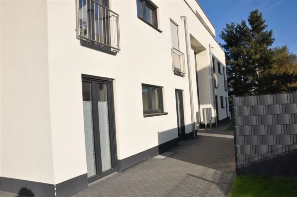 Erstbezug: Exklusive Erdgeschoss-Terrassenwohnung mit TG-Platz in gehobenem Wohnumfeld! - Foto 1