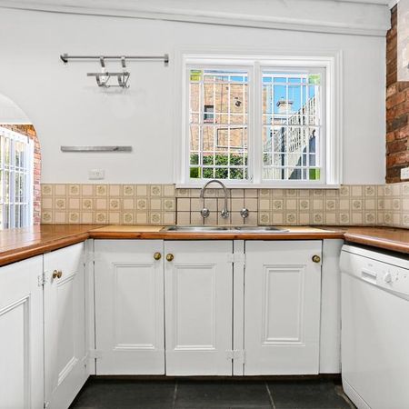 REFURBISHED HOME IN THE HEART OF IT ALL! - Photo 2