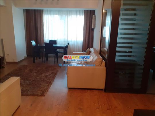 INCHIRIERE APARTAMENT 3 CAMERE ULTRACENTRAL modern fond nou - Fotografie 1