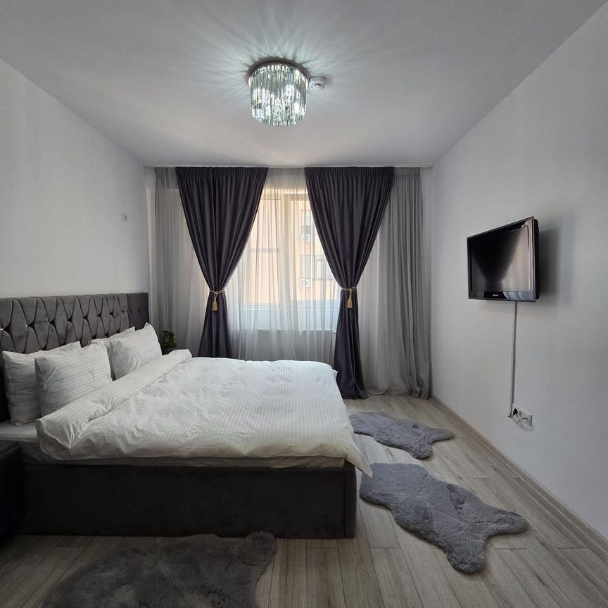 INCHIRIERE-APARTAMENT PREMIUM-MUTARE IMEDIATA-LOC DE PARCARE - Fotografie 1