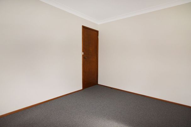 CONVENIENTLY LOCATED TWO BEDROOM VILLA - Photo 1