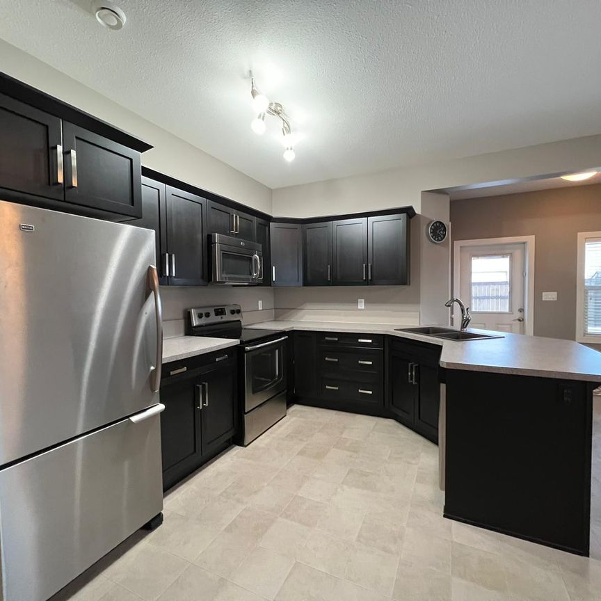 Blackfalds!! Separate Entrance! Separate Yard! - Photo 1