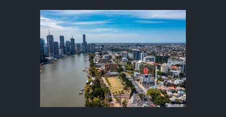 Nestled in the vibrant and picturesque suburb of Kangaroo Point, this property offers an exceptional living experience that combines modern comfort - Photo 3