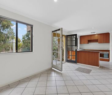 Dual-Level Living with Style, Space & Solar! - Photo 4