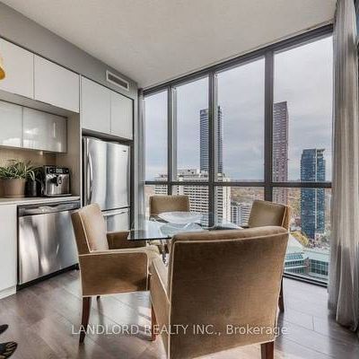 Bloor E/Ted Rogers Way-Open Bright 1Bd+Den w Murphy Bd &Cabinetry - Photo 1