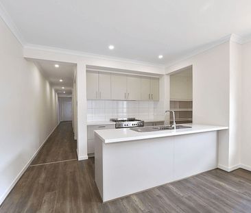 Spacious, Near-New Living with Dual Zones in a Prime Attwood Setting - Photo 2