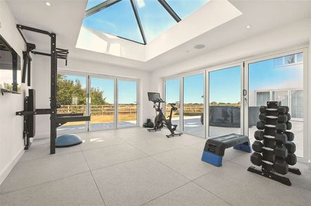 A high specification five bedroom home surrounded by open countryside. - Photo 2