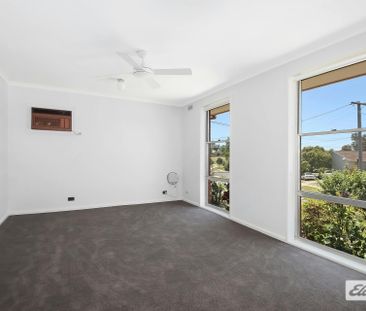 Fully Renovated 3-Bedroom Home with Spacious Yard - Photo 6