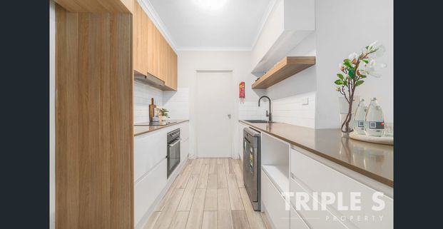Full Brick Apartment in A Sought-After Location - Photo 1