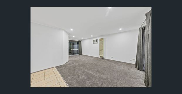 Comfortable Family Home with Spacious Outdoor Entertaining! - Photo 1