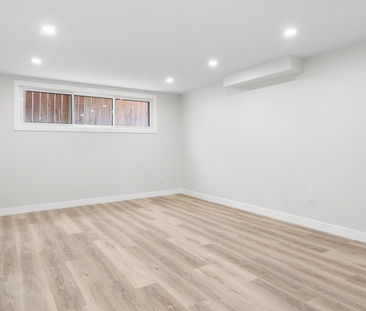Renovated Lower Level Suite | Bright Open Layout | Private Laundry ... - Photo 1