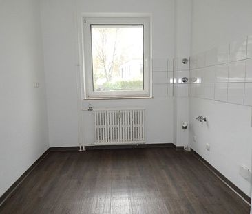 Wunderschön renovierte EG-Wohnung mit ebenerdiger Dusche und Balkon - Foto 1