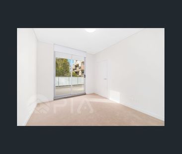 Modern 2 bedroom apartment close to amenities for lease - Photo 1