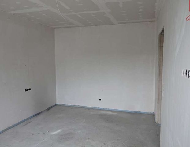 Ansprechende und hochwertige 3-Zimmer-Obergeschosswohnung mit Einbauküche am Stadtrand von Esens! - Foto 1