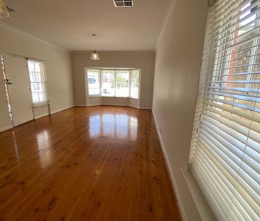 Sunlit, spacious, detached homette-style unit with private rear cou... - Photo 1