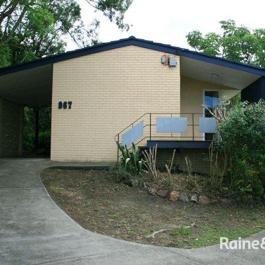 Charming Home in Prime Location with Expansive Yard - Photo 1