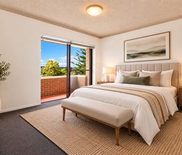TOP FLOOR APARTMENT WITH PRIVATE BALCONY & EXPANSIVE AREA VIEWS! - Photo 2
