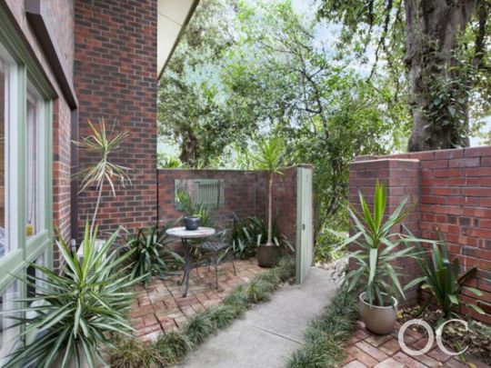 Open the Door To Refreshing, Low‑Maintenance Living in Prestigious Parkside - Photo 1