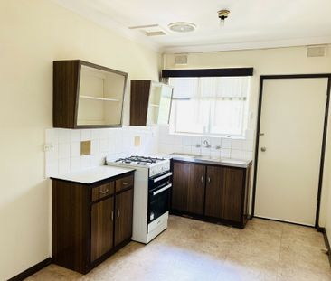 Charming 2-Bedroom Unit with Classic Appeal - Photo 5